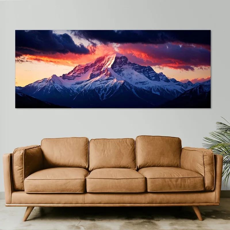 Wall Mural Mountains Majestic Snow-Capped Mountain At Sunset With Dramatic Sky