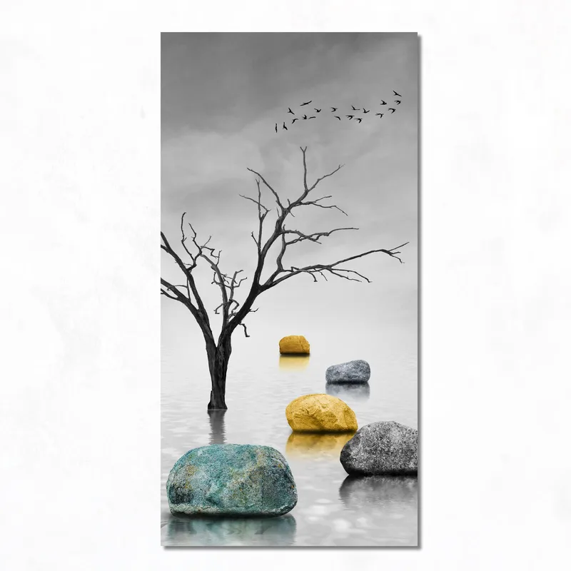 Kunstdruck schwarzer baum und farbige steine